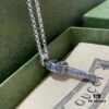 692ff14099f2d84055c8d784 Winter Essential — Gucci Key Necklace, Silver Pendant for Sweaters