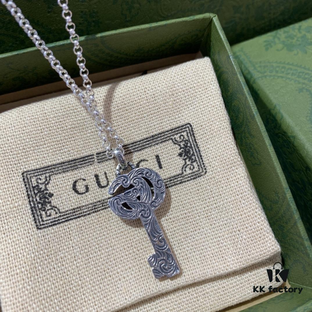 692ff14799f2d84055c8d78c Winter Essential — Gucci Key Necklace, Silver Pendant for Sweaters