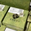 692ff1f399f2d84055c8d8ca GUCCI Overseas Member Gift - Gucci Gold-Trimmed Double G Ceramic Ring