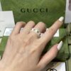 692ff1f899f2d84055c8d8d2 GUCCI Overseas Member Gift - Gucci Gold-Trimmed Double G Ceramic Ring