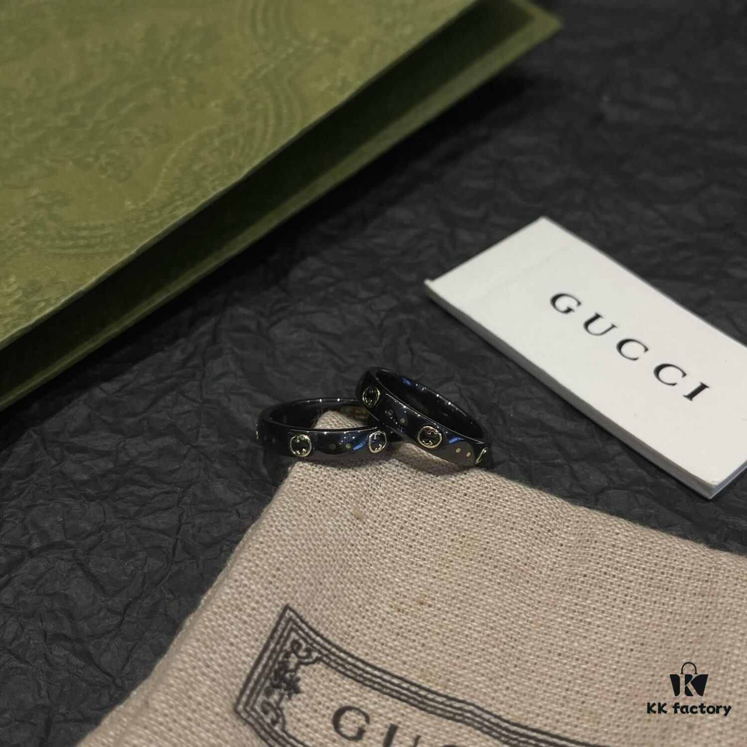 692ff27799f2d84055c8d969 Gucci • Gucci Icon Interlocking Double G Ring, Icon Series, Brand's Signature Pattern, Featuring a Striking Gold Interlocking Double G Logo Creating a Bold Visual Contrast with the White Synthetic Corundum Band