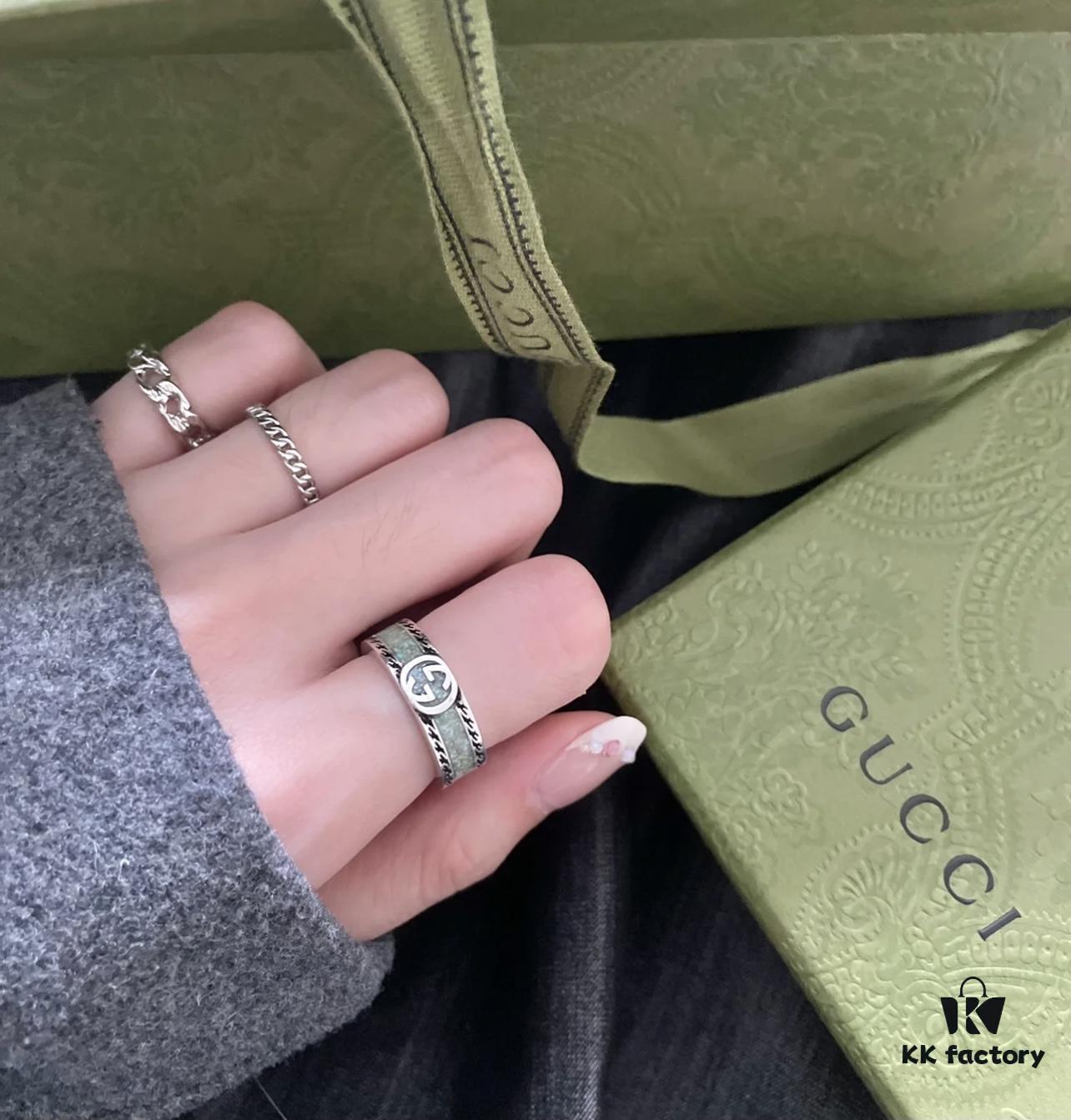 692ff28e99f2d84055c8d99f GUCCI New Arrival Interlocking Double G Ring with Stone Texture in Thin Brown and Gem Green Enamel