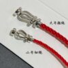 692ff38499f2d84055c8db56 FRED France FORCE 10 Series Horse-Shoe Buckle Figure-8 Knot Red Rope Bracelet