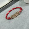692ff42799f2d84055c8dc58 New Release! Fred Large Semi-Pave Cross Knot 18K Gold Plated Steel Cable Bracelet