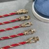 692ff42d99f2d84055c8dc61 New Release! Fred Large Semi-Pave Cross Knot 18K Gold Plated Steel Cable Bracelet