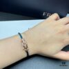 692ff66299f2d84055c8df67 FRED Fred Bracelet, Medium Rose Gold Force 10 Collection with Black and White Gemstones, Steel Cord Bracelet