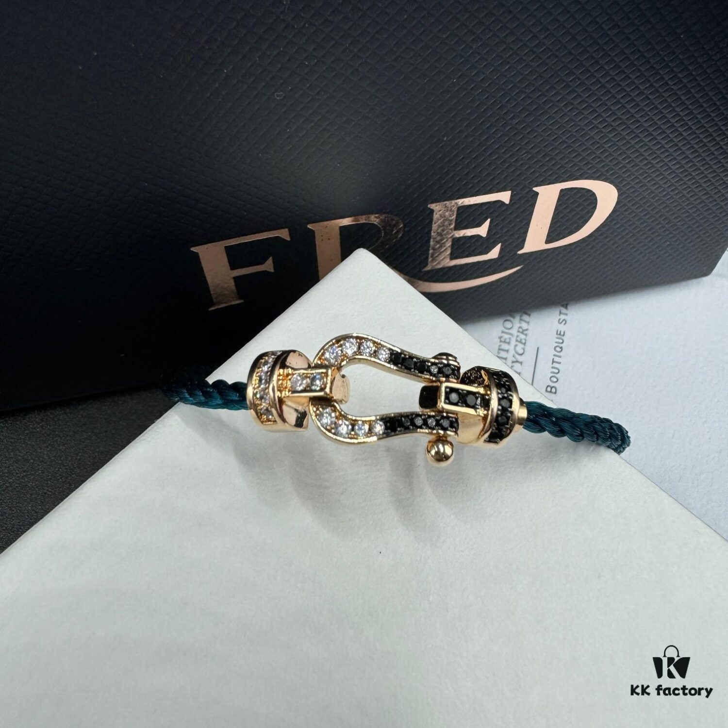692ff66599f2d84055c8df6b FRED Fred Bracelet, Medium Rose Gold Force 10 Collection with Black and White Gemstones, Steel Cord Bracelet