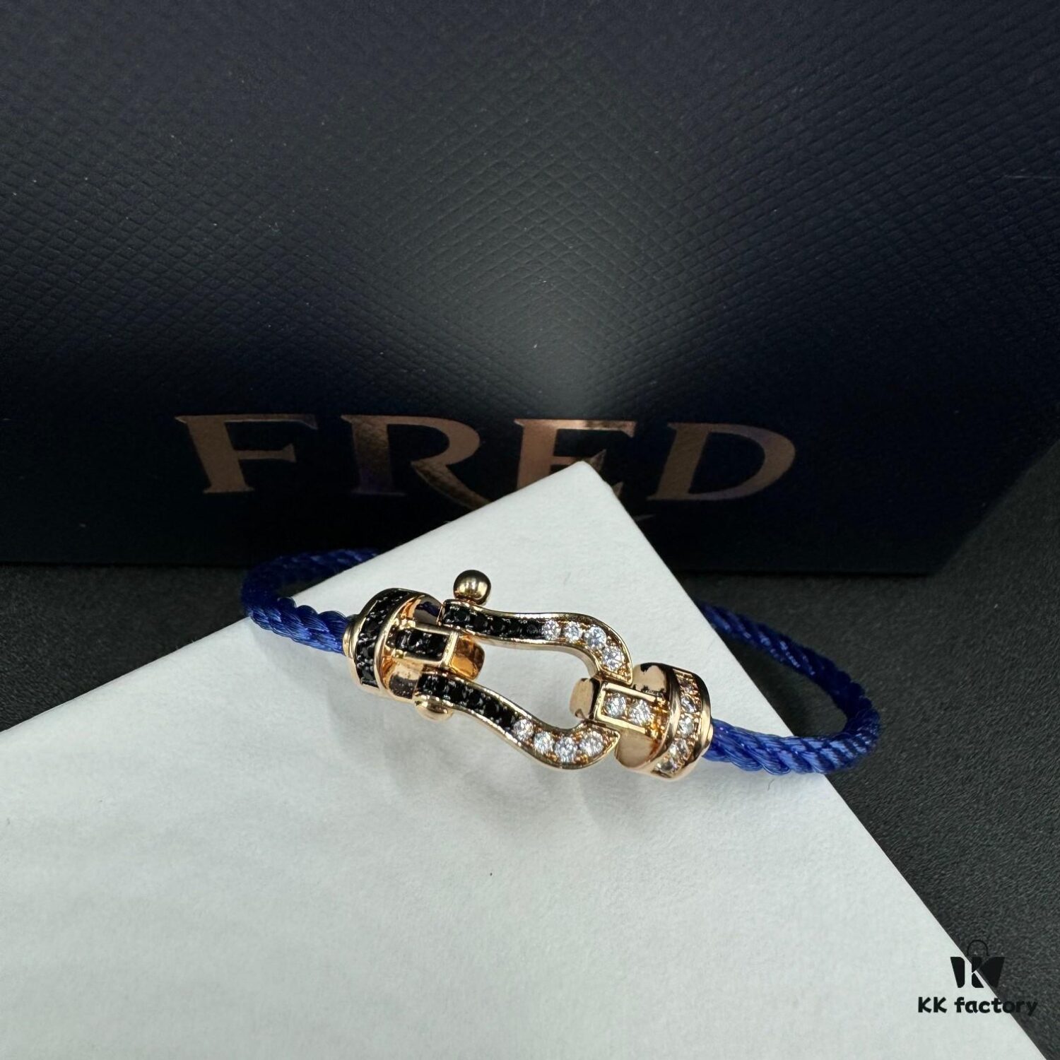 692ff66999f2d84055c8df70 FRED Force 10 Bracelet in Medium Rose Gold with Black and White Gemstones, Steel Cable Design