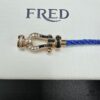 692ff66a99f2d84055c8df71 FRED Force 10 Bracelet in Medium Rose Gold with Black and White Gemstones, Steel Cable Design