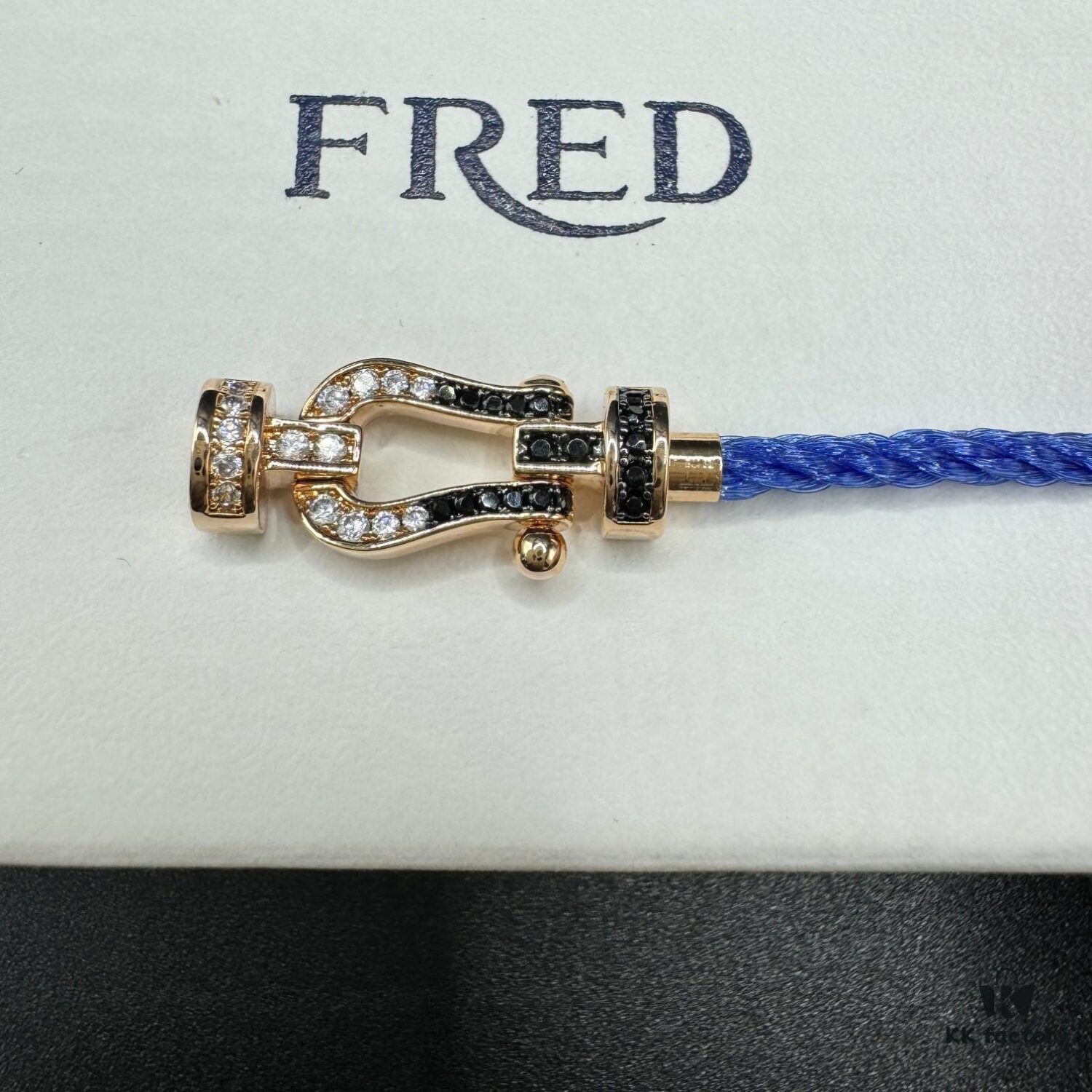 692ff66a99f2d84055c8df71 FRED Force 10 Bracelet in Medium Rose Gold with Black and White Gemstones, Steel Cable Design