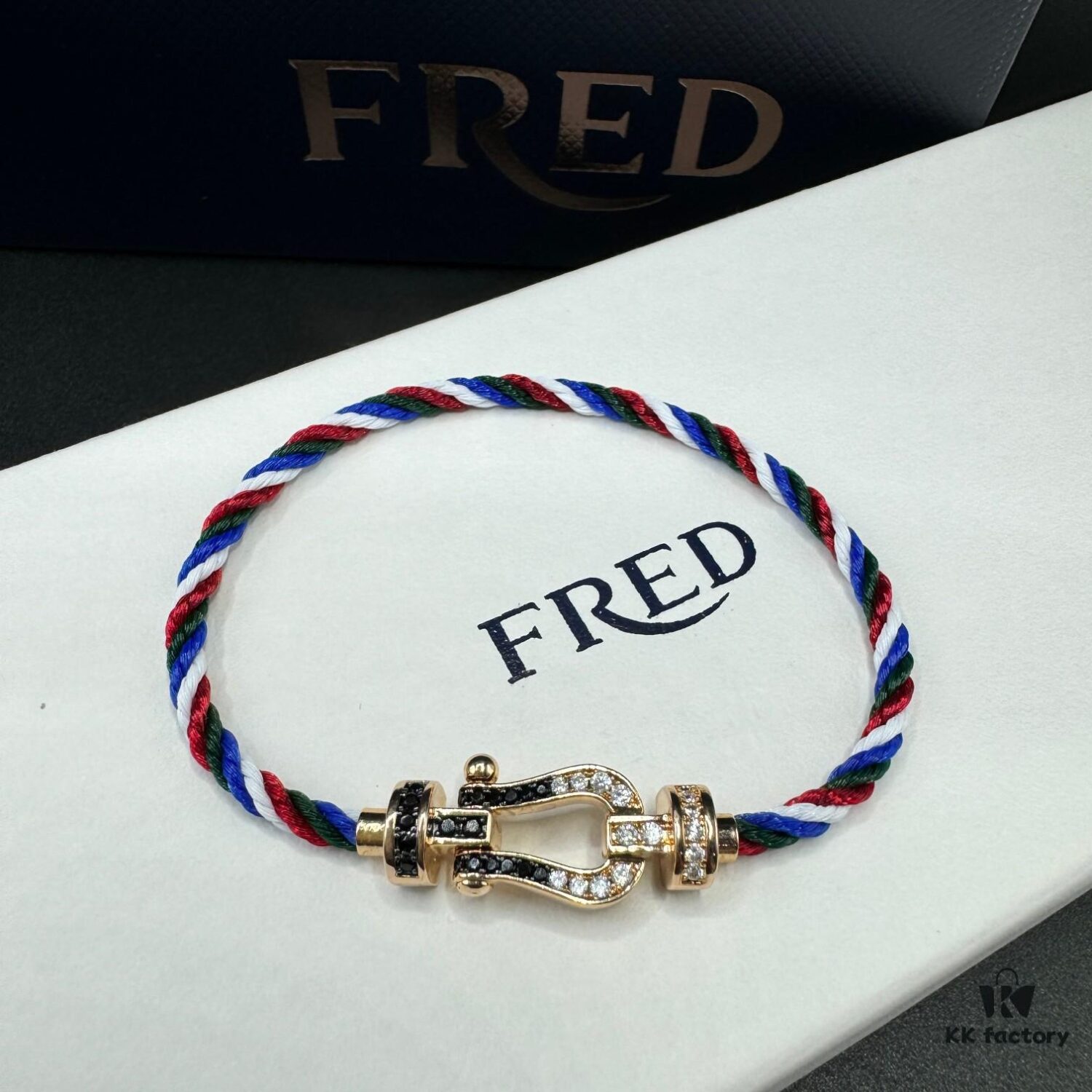 692ff67099f2d84055c8df78 FRED Force 10 Bracelet in Rose Gold, Medium Size with Black and White Gemstones, Steel Cord Design