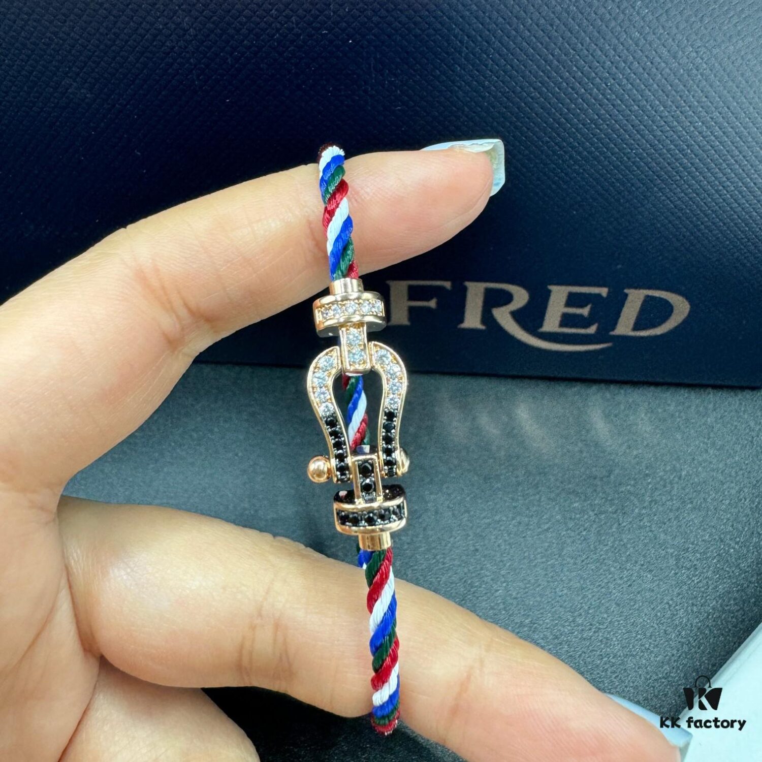 692ff67099f2d84055c8df79 FRED Force 10 Bracelet in Rose Gold, Medium Size with Black and White Gemstones, Steel Cord Design