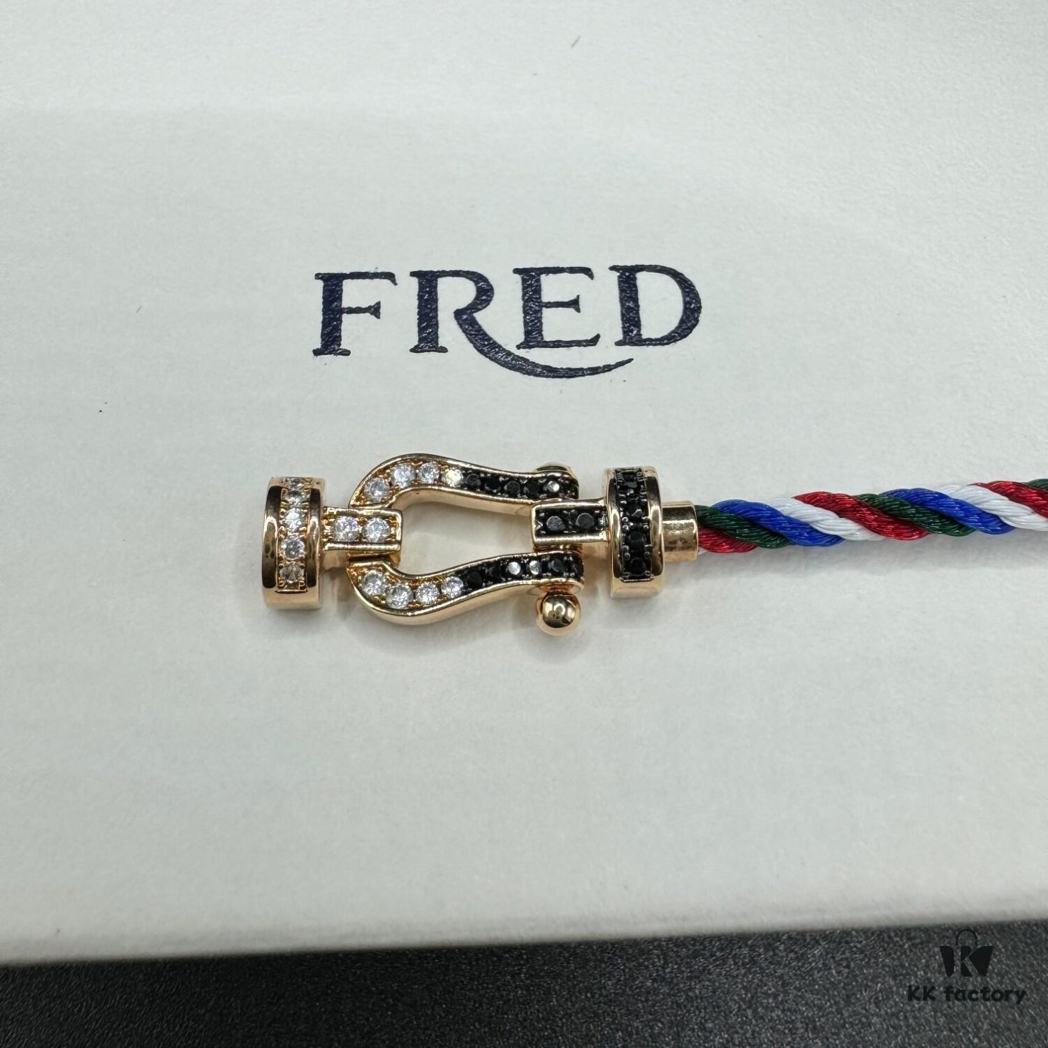 692ff67299f2d84055c8df7a FRED Force 10 Bracelet in Rose Gold, Medium Size with Black and White Gemstones, Steel Cord Design