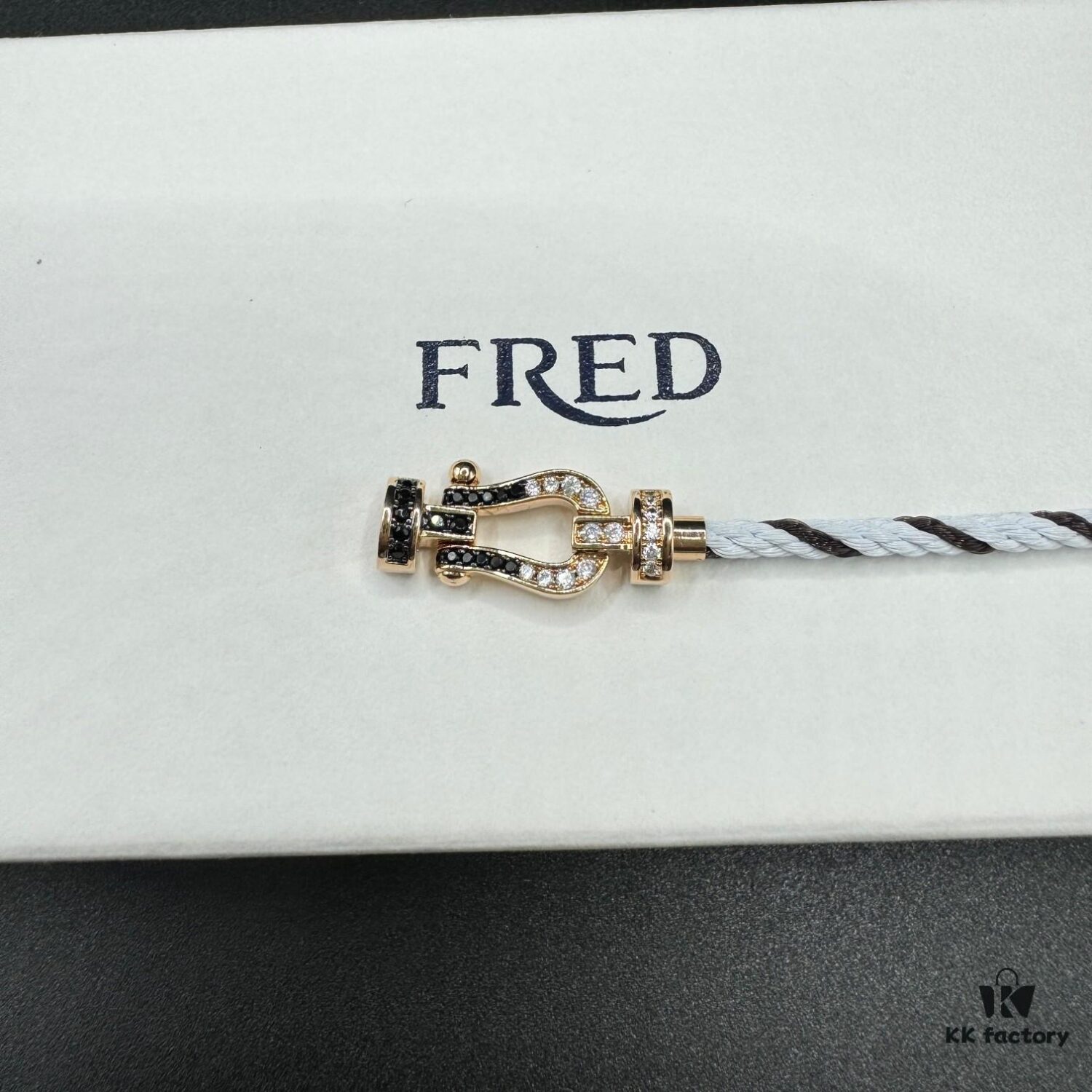 692ff67299f2d84055c8df7b FRED Force 10 Bracelet in Rose Gold, Medium Size with Black and White Gemstones, Steel Cord Design