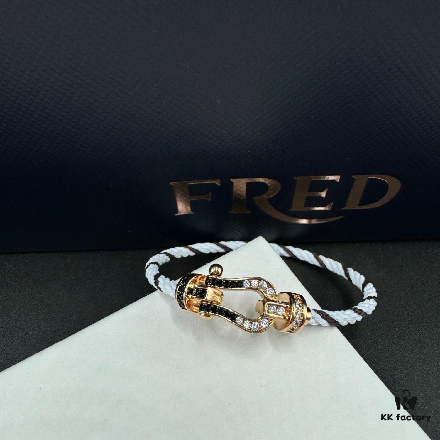 692ff67599f2d84055c8df7c FRED Force 10 Bracelet in Rose Gold, Medium Size with Black and White Gemstones, Steel Cord Design