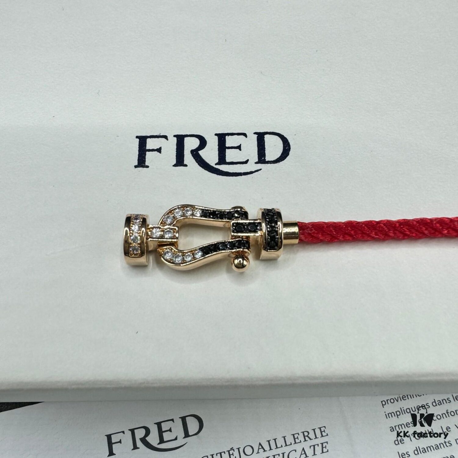 692ff67799f2d84055c8df80 FRED Fred Bracelet, Medium Rose Gold Force 10 with Black and White Gemstones, Steel Cord Bracelet