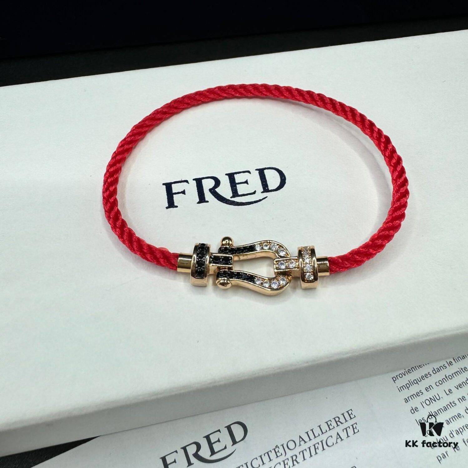 692ff67999f2d84055c8df81 FRED Fred Bracelet, Medium Rose Gold Force 10 with Black and White Gemstones, Steel Cord Bracelet
