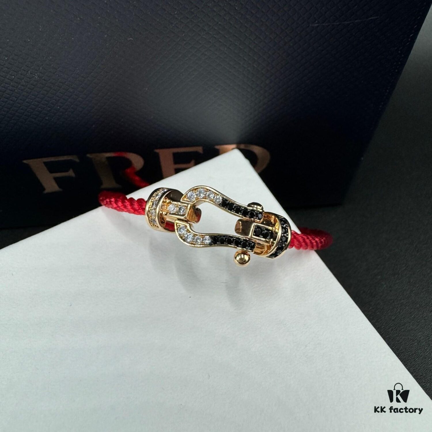 692ff67999f2d84055c8df82 FRED Fred Bracelet, Medium Rose Gold Force 10 with Black and White Gemstones, Steel Cord Bracelet