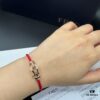 692ff67b99f2d84055c8df84 FRED Fred Bracelet, Medium Rose Gold Force 10 with Black and White Gemstones, Steel Cord Bracelet