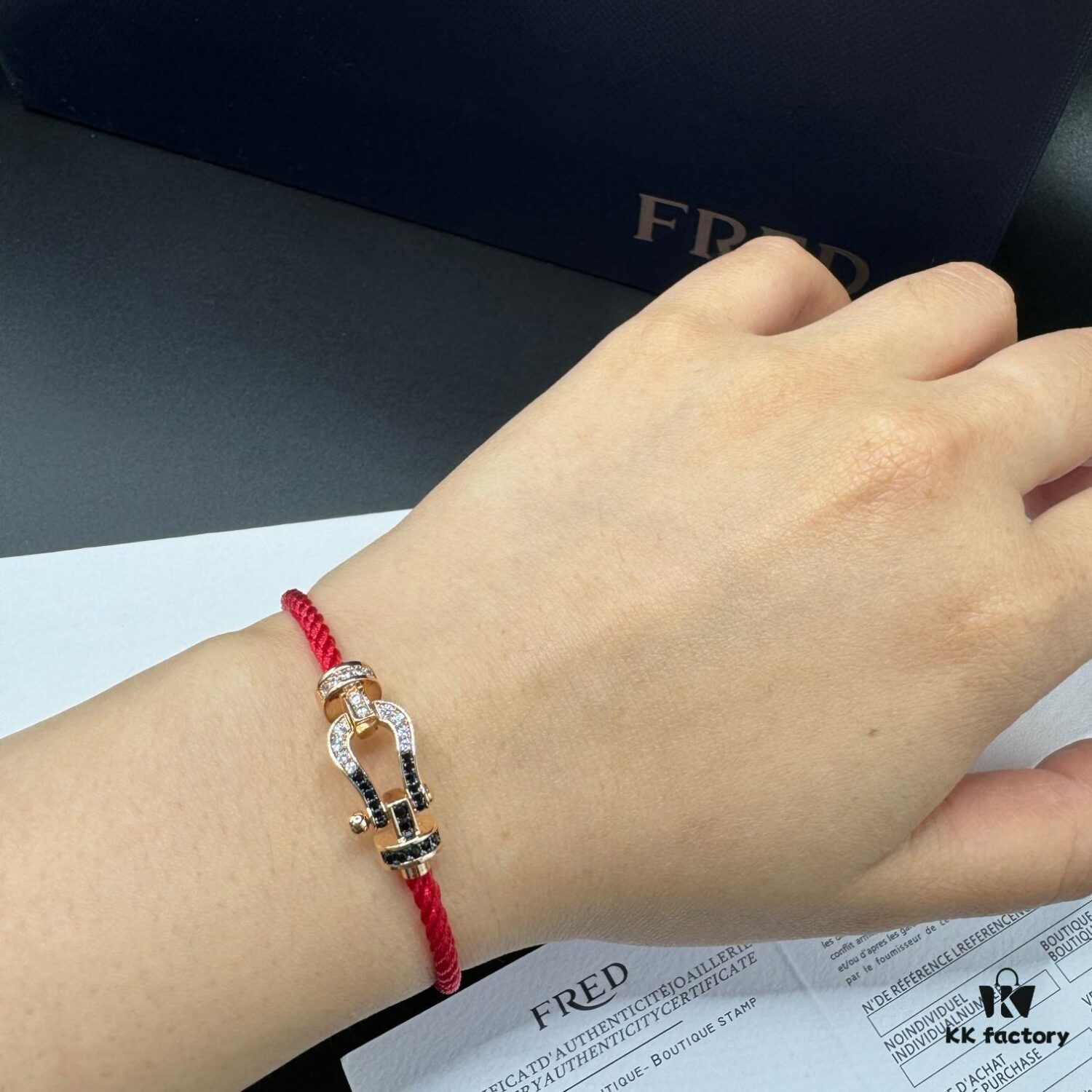 692ff67b99f2d84055c8df84 FRED Fred Bracelet, Medium Rose Gold Force 10 with Black and White Gemstones, Steel Cord Bracelet