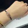 692ff68199f2d84055c8df8e FRED Force 10 Bracelet in Rose Gold with Black and White Gemstones, Medium Size, Steel Cable Design