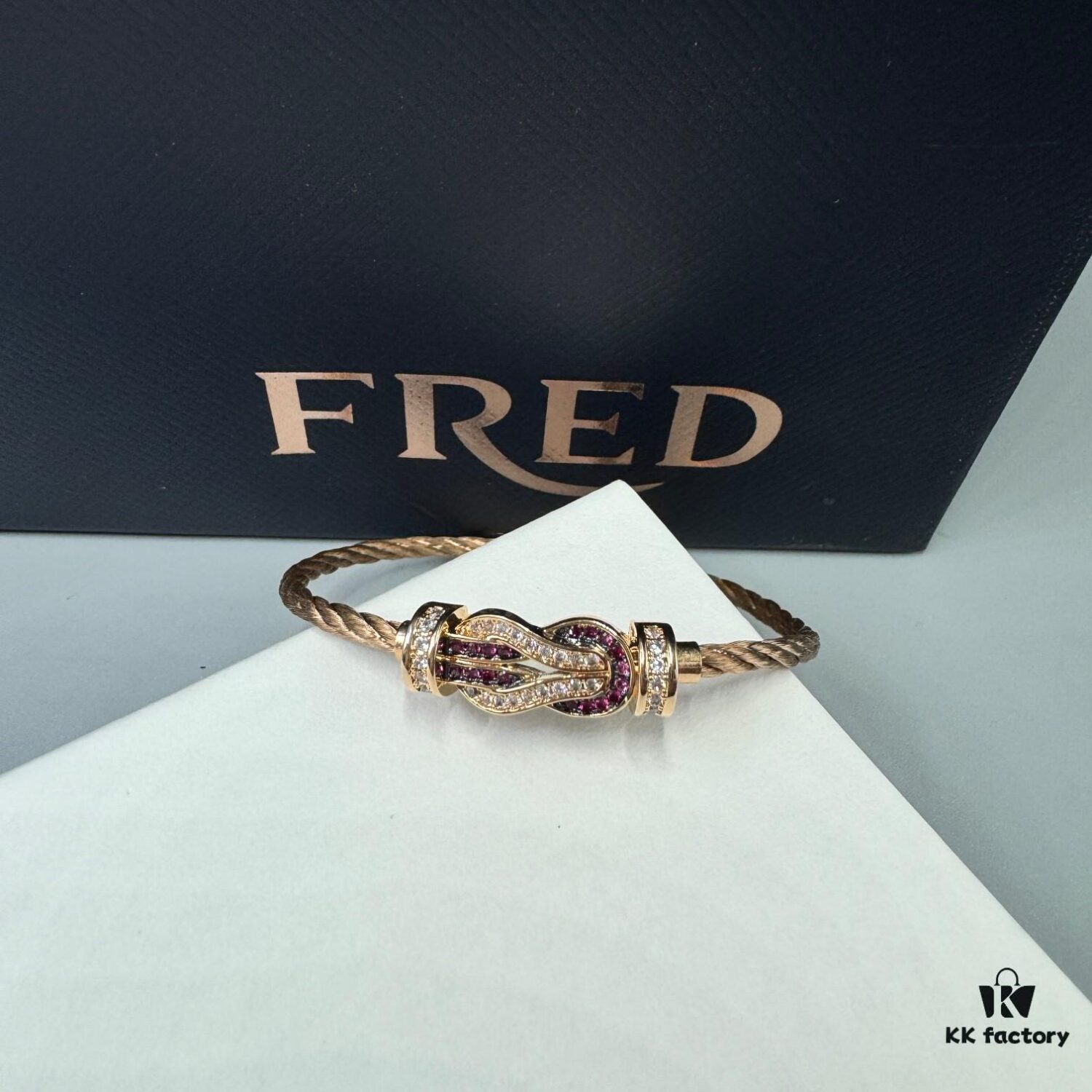 692ff68399f2d84055c8df8f FRED Force 10 Bracelet in Rose Gold, Medium Size with Ruby Cabochon and Stainless Steel Cable