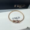692ff68499f2d84055c8df91 FRED Force 10 Bracelet in Rose Gold, Medium Size with Ruby Cabochon and Stainless Steel Cable