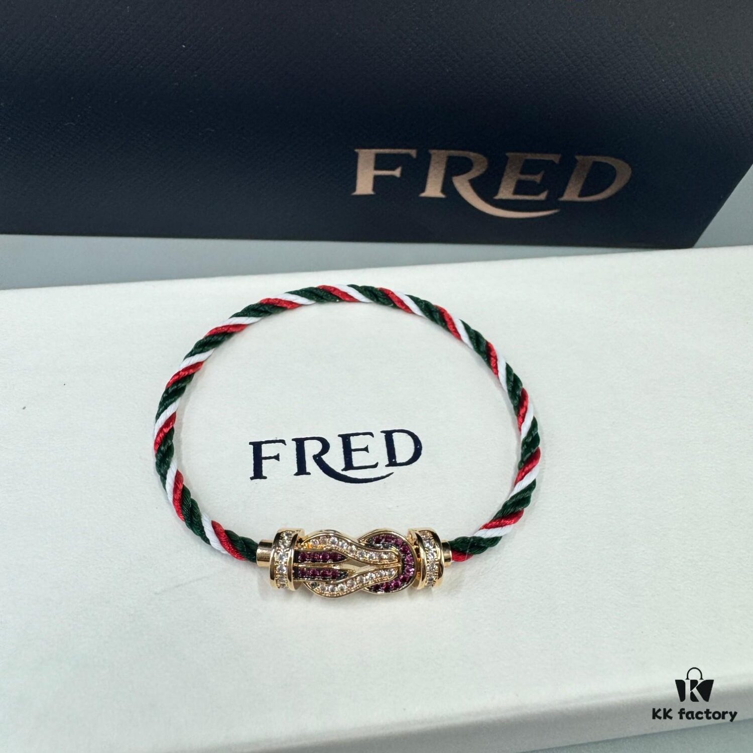 692ff68b99f2d84055c8df9b FRED Force 10 Bracelet in Rose Gold with Ruby Cabochon, Medium Size, Steel Cable Design