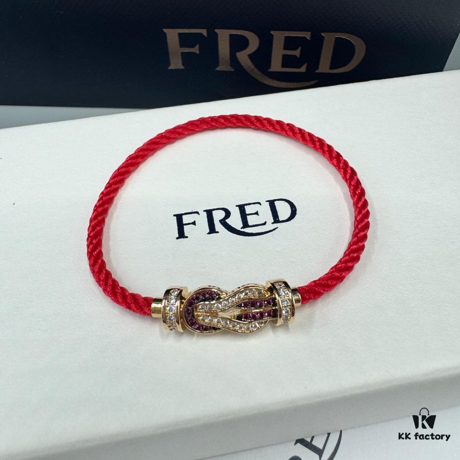 692ff68e99f2d84055c8df9e FRED Force 10 Bracelet in Rose Gold with Ruby, Medium Size, Red Sapphire Model, Steel Cord Design