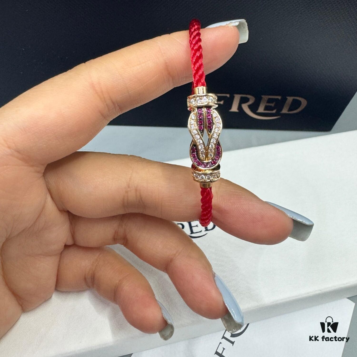 692ff69099f2d84055c8dfa0 FRED Force 10 Bracelet in Rose Gold with Ruby, Medium Size, Red Sapphire Model, Steel Cord Design