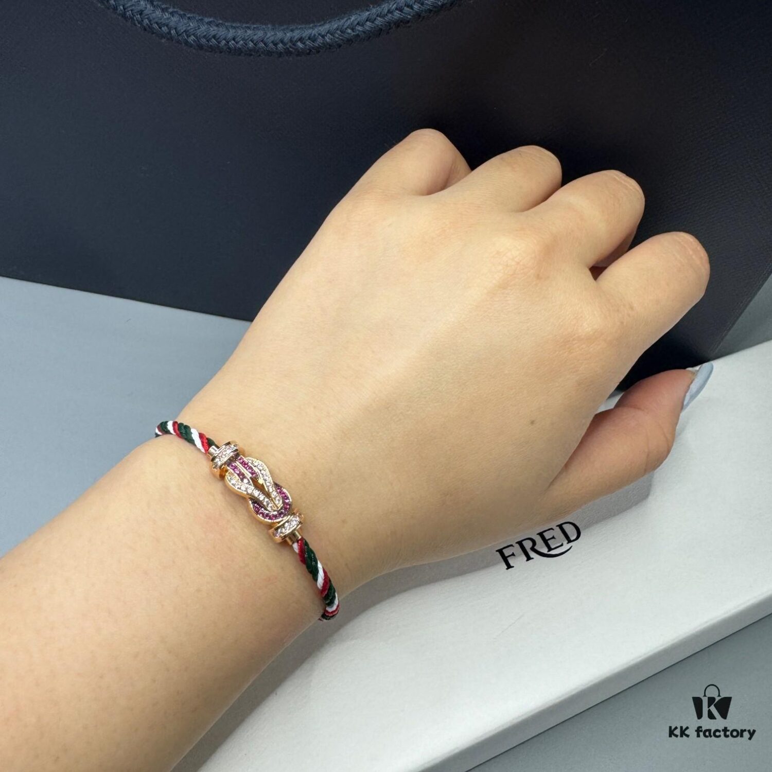 692ff69099f2d84055c8dfa1 FRED Force 10 Bracelet in Rose Gold with Ruby Cabochon, Medium Size, Steel Cable Design
