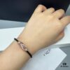 692ff69299f2d84055c8dfa3 FRED Force 10 Bracelet in Rose Gold, Medium Size with Ruby Cabochon and Steel Cable
