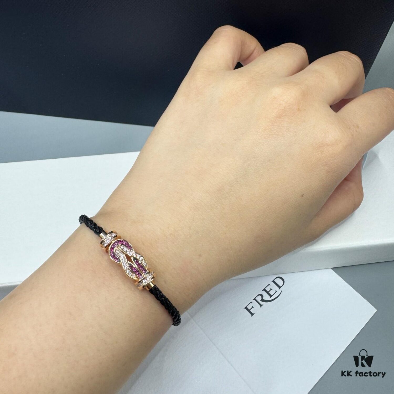 692ff69299f2d84055c8dfa3 FRED Force 10 Bracelet in Rose Gold, Medium Size with Ruby Cabochon and Steel Cable