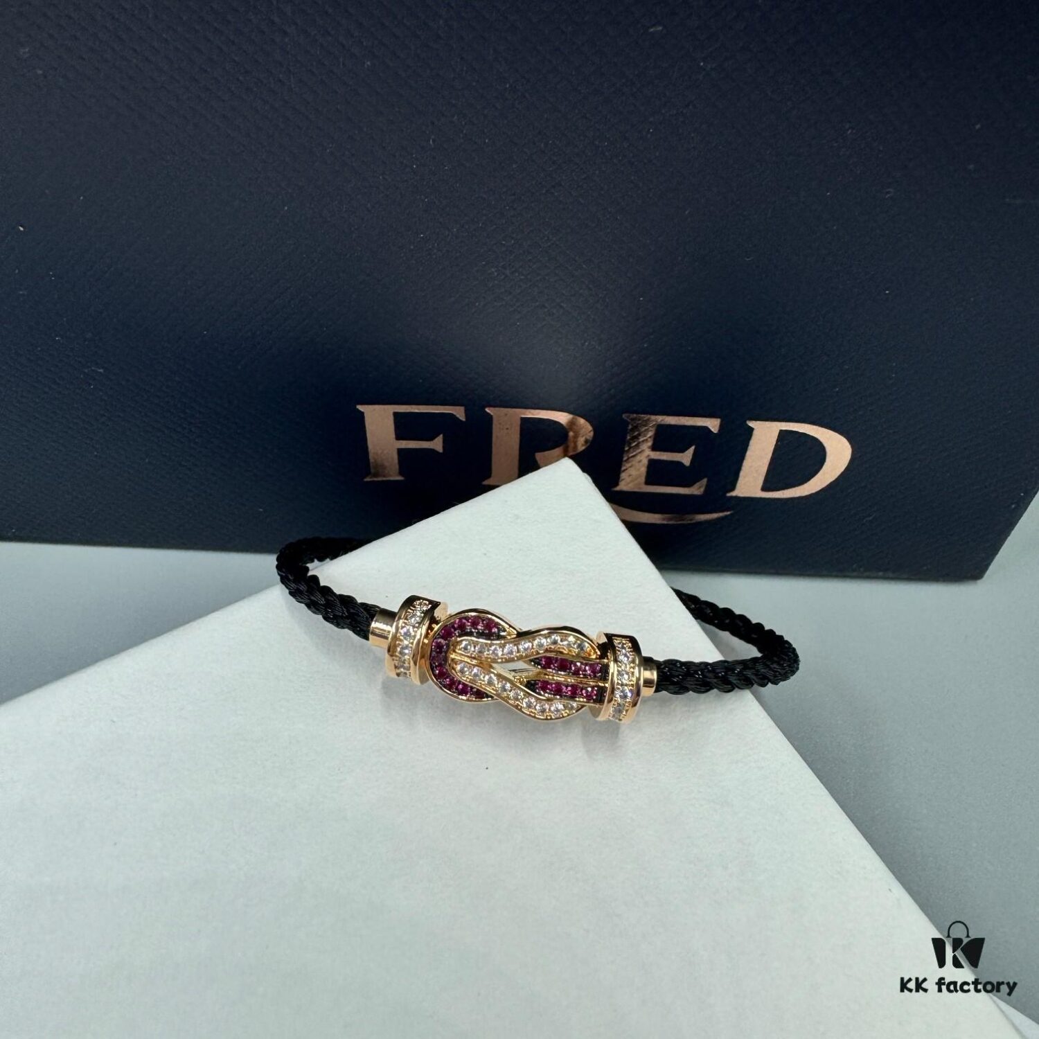 692ff69299f2d84055c8dfa4 FRED Force 10 Bracelet in Rose Gold, Medium Size with Ruby Cabochon and Steel Cable