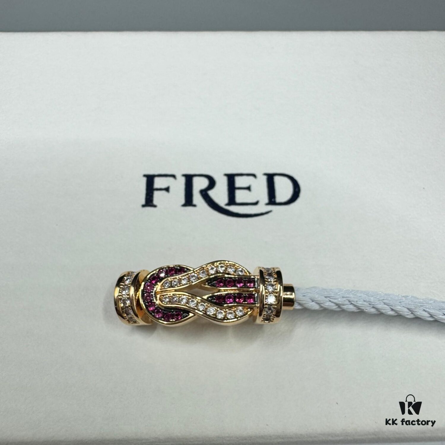 692ff69a99f2d84055c8dfad FRED Force 10 Bracelet in Rose Gold with Ruby, Medium Size, Stainless Steel Cord