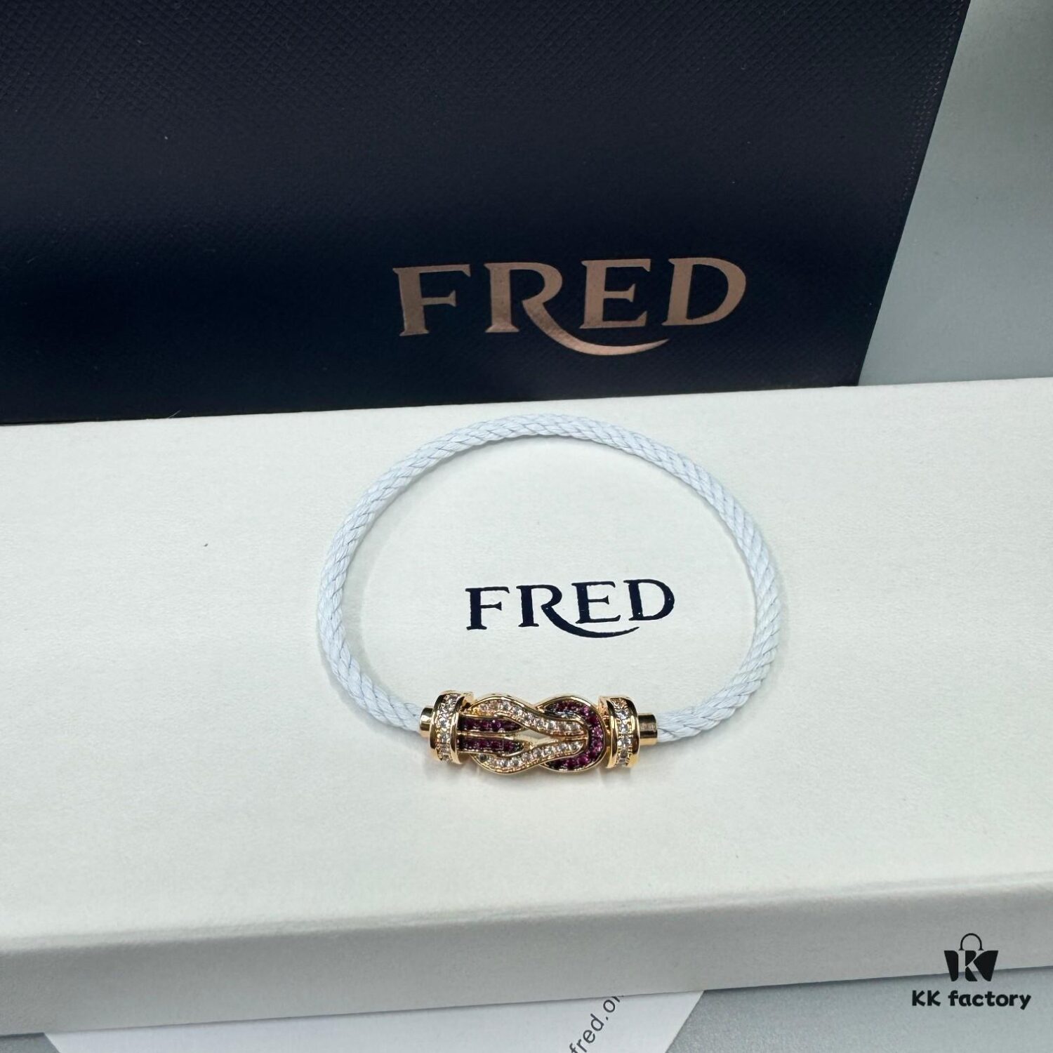 692ff69b99f2d84055c8dfae FRED Force 10 Bracelet in Rose Gold with Ruby, Medium Size, Stainless Steel Cord