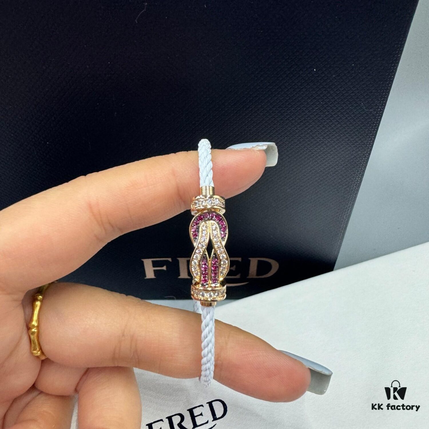692ff69c99f2d84055c8dfaf FRED Force 10 Bracelet in Rose Gold with Ruby, Medium Size, Stainless Steel Cord