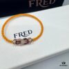 692ff69f99f2d84055c8dfb3 FRED Force 10 Bracelet in Rose Gold, Medium Size with Ruby Cabochon and Stainless Steel Cord