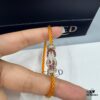 692ff6a199f2d84055c8dfb7 FRED Force 10 Bracelet in Rose Gold, Medium Size with Ruby Cabochon and Stainless Steel Cord