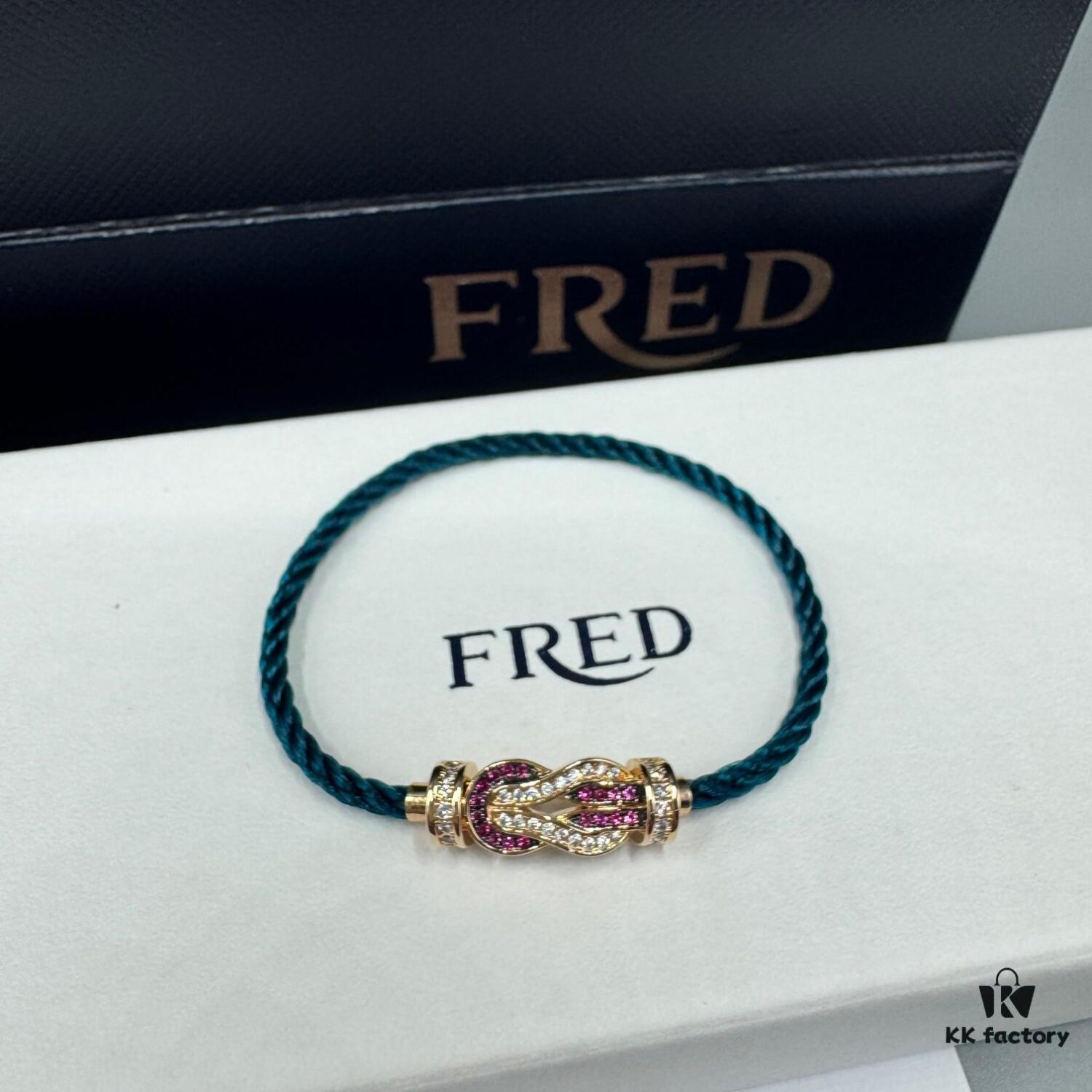 692ff6a599f2d84055c8dfbb FRED Force 10 Bracelet in Rose Gold with Ruby, Medium Size, Red Gemstone Slide Buckle, Steel Cable Design