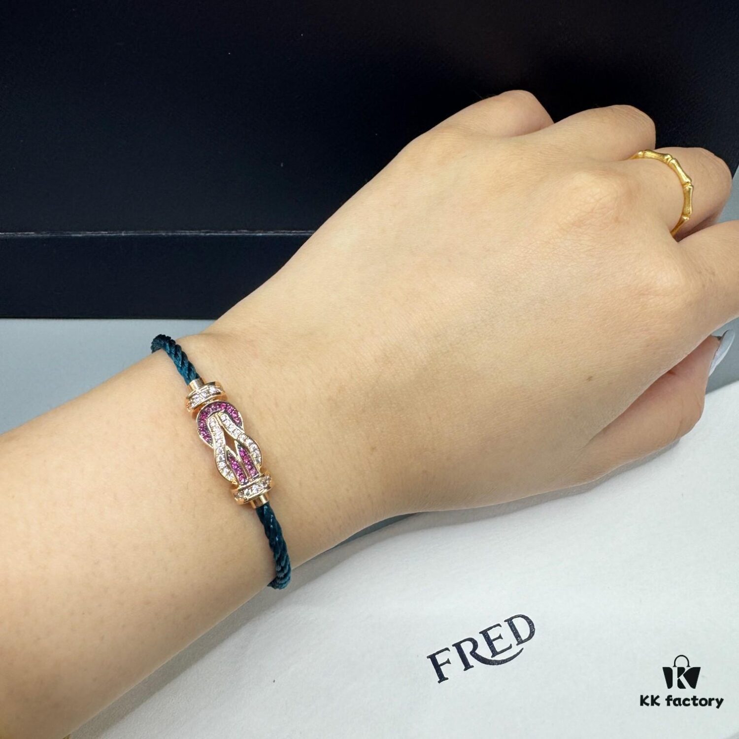 692ff6a699f2d84055c8dfbc FRED Force 10 Bracelet in Rose Gold with Ruby, Medium Size, Red Gemstone Slide Buckle, Steel Cable Design