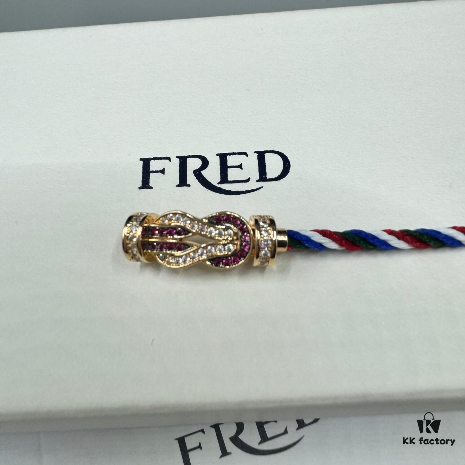 692ff6a999f2d84055c8dfc0 FRED Force 10 Bracelet in Rose Gold, Medium Size with Ruby Cabochon and Steel Cable