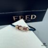692ff6ad99f2d84055c8dfc6 FRED Force 10 Bracelet in Rose Gold with Ruby, Medium Size, Red Gemstone Slide Buckle, Steel Cable Design