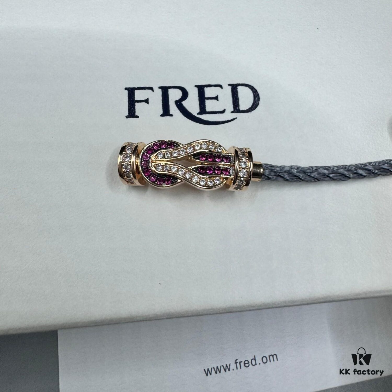 692ff6b299f2d84055c8dfca FRED Force 10 Bracelet in Rose Gold with Ruby, Medium Size, Red Sapphire Cabochon, Steel Cable Design