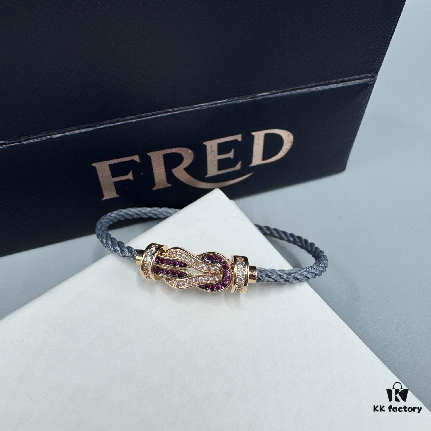 692ff6b299f2d84055c8dfcb FRED Force 10 Bracelet in Rose Gold with Ruby, Medium Size, Red Sapphire Cabochon, Steel Cable Design