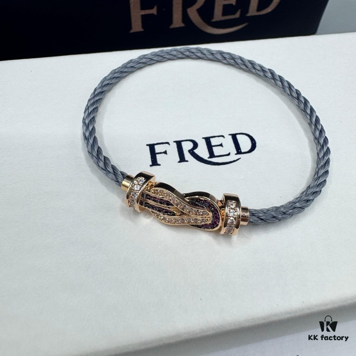 692ff6b399f2d84055c8dfce FRED Force 10 Bracelet in Rose Gold with Ruby, Medium Size, Red Sapphire Cabochon, Steel Cable Design