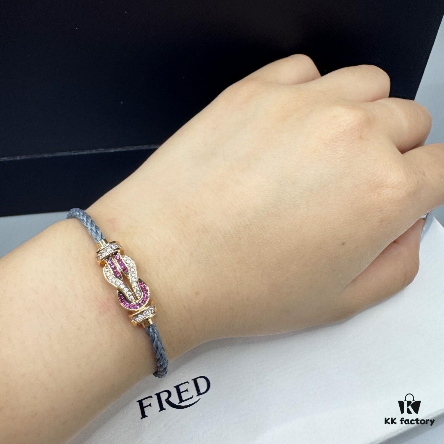 692ff6b599f2d84055c8dfd0 FRED Force 10 Bracelet in Rose Gold with Ruby, Medium Size, Red Sapphire Cabochon, Steel Cable Design