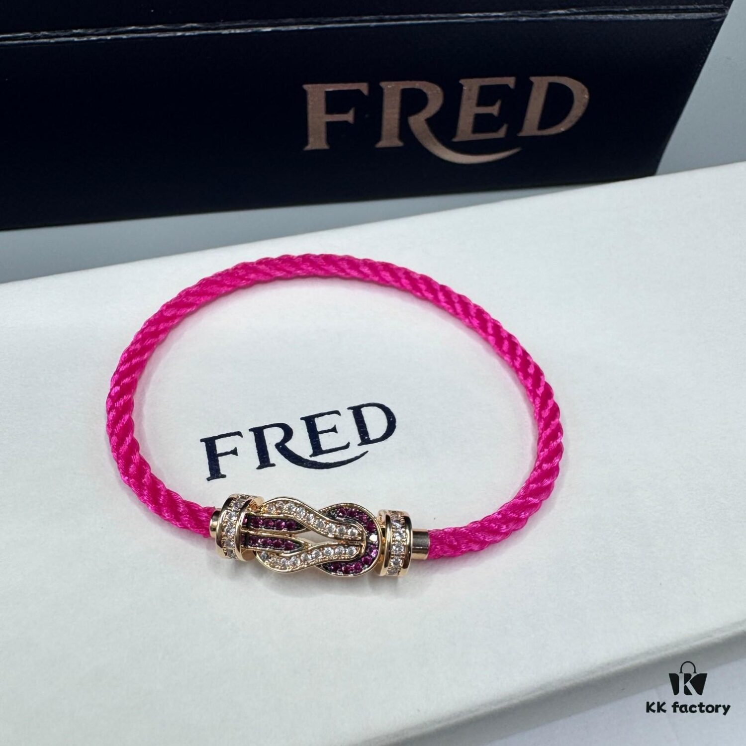 692ff6b799f2d84055c8dfd5 FRED Force 10 Bracelet in Rose Gold with Ruby, Medium Size, Red Sapphire Model, Steel Cord Version