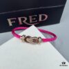 692ff6b899f2d84055c8dfd6 FRED Force 10 Bracelet in Rose Gold with Ruby, Medium Size, Red Sapphire Model, Steel Cord Version