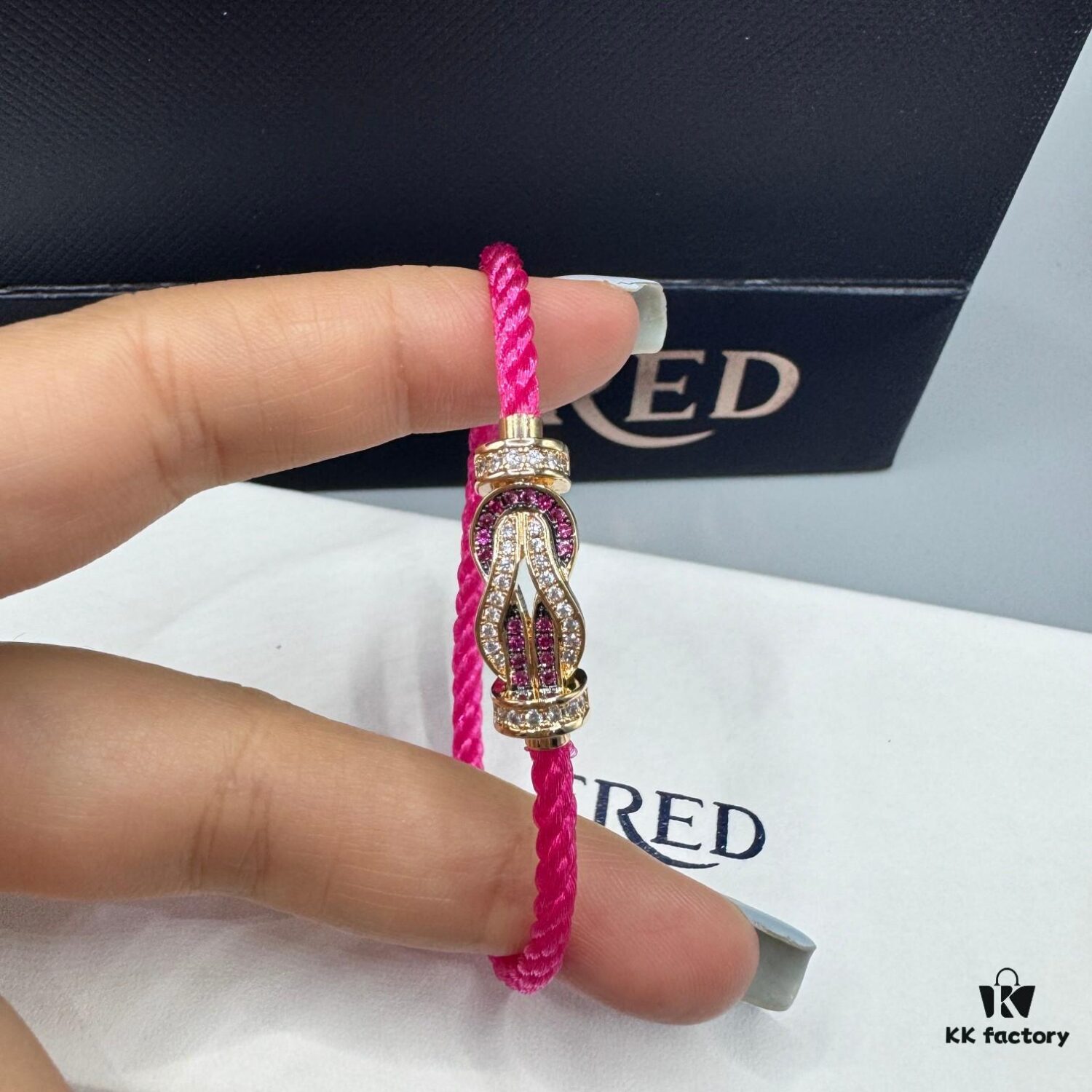692ff6ba99f2d84055c8dfd8 FRED Force 10 Bracelet in Rose Gold with Ruby, Medium Size, Red Sapphire Model, Steel Cord Version